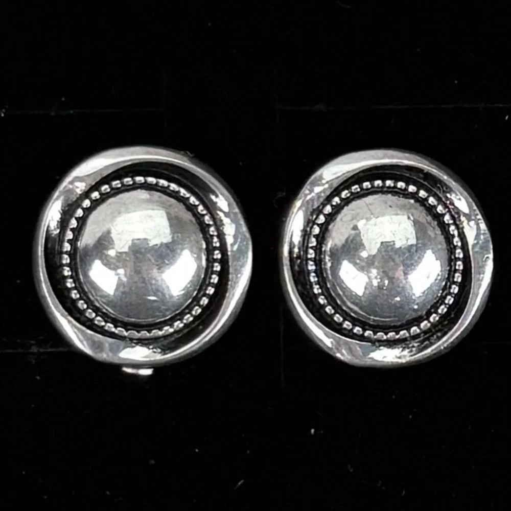 Vintage Silvertone round weighted clip on earrings